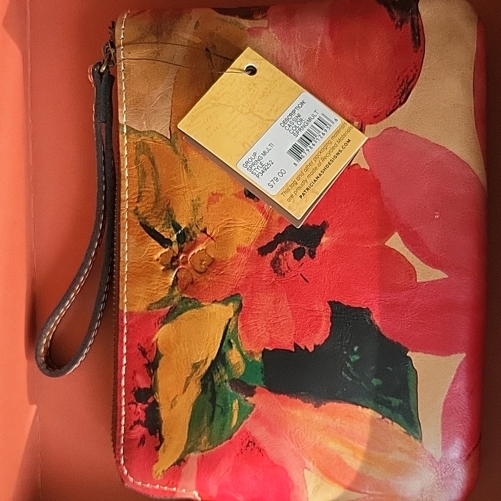 Patricia Nash leather wristlet, orange and tan